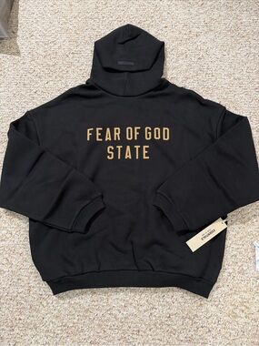 Essentials Fear of God State Black Hoodie with Gold Lettering